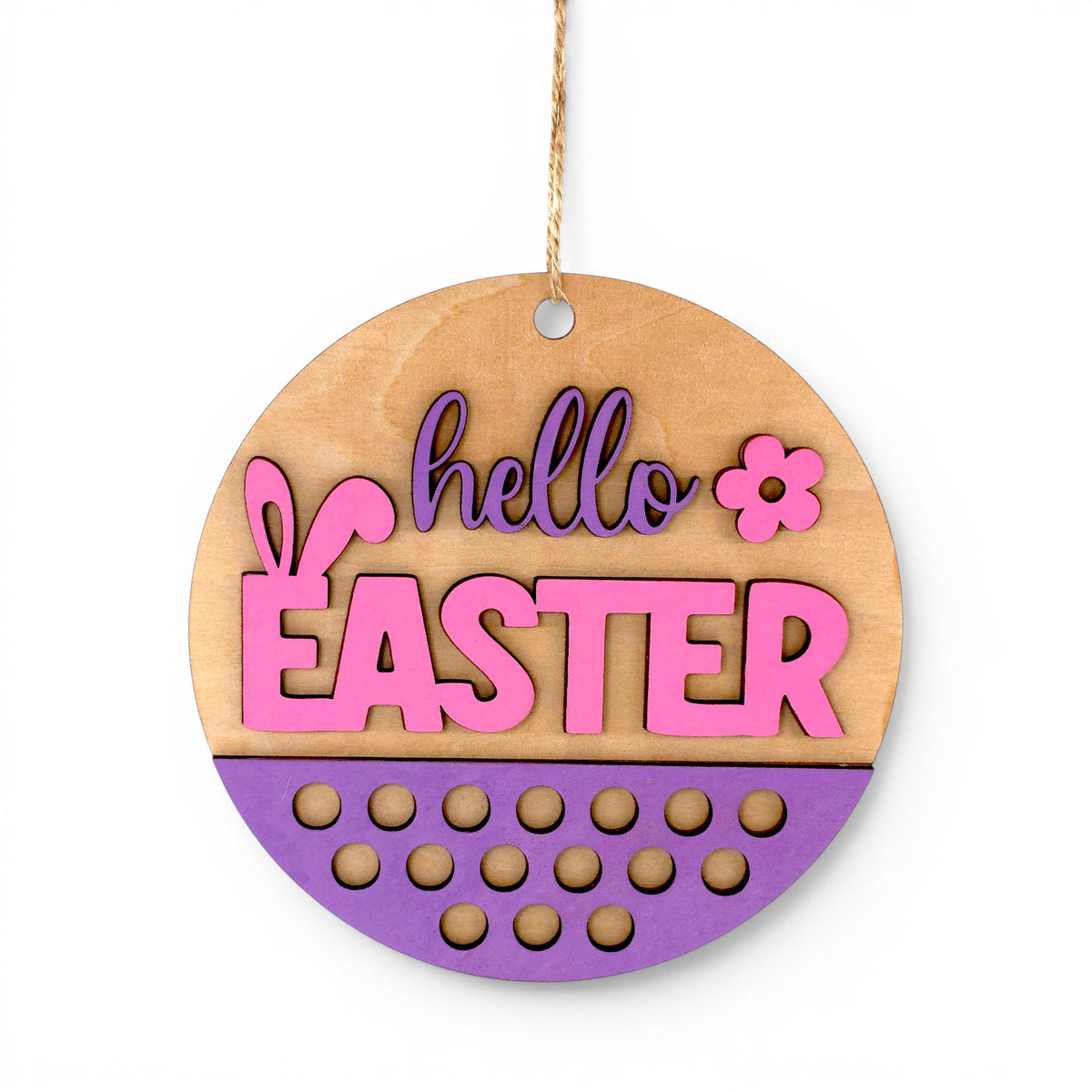 Round Easter Hanging Wood Sign with pink and purple "hello EASTER" lettering, bunny ears, and floral accent. Front view of sign.