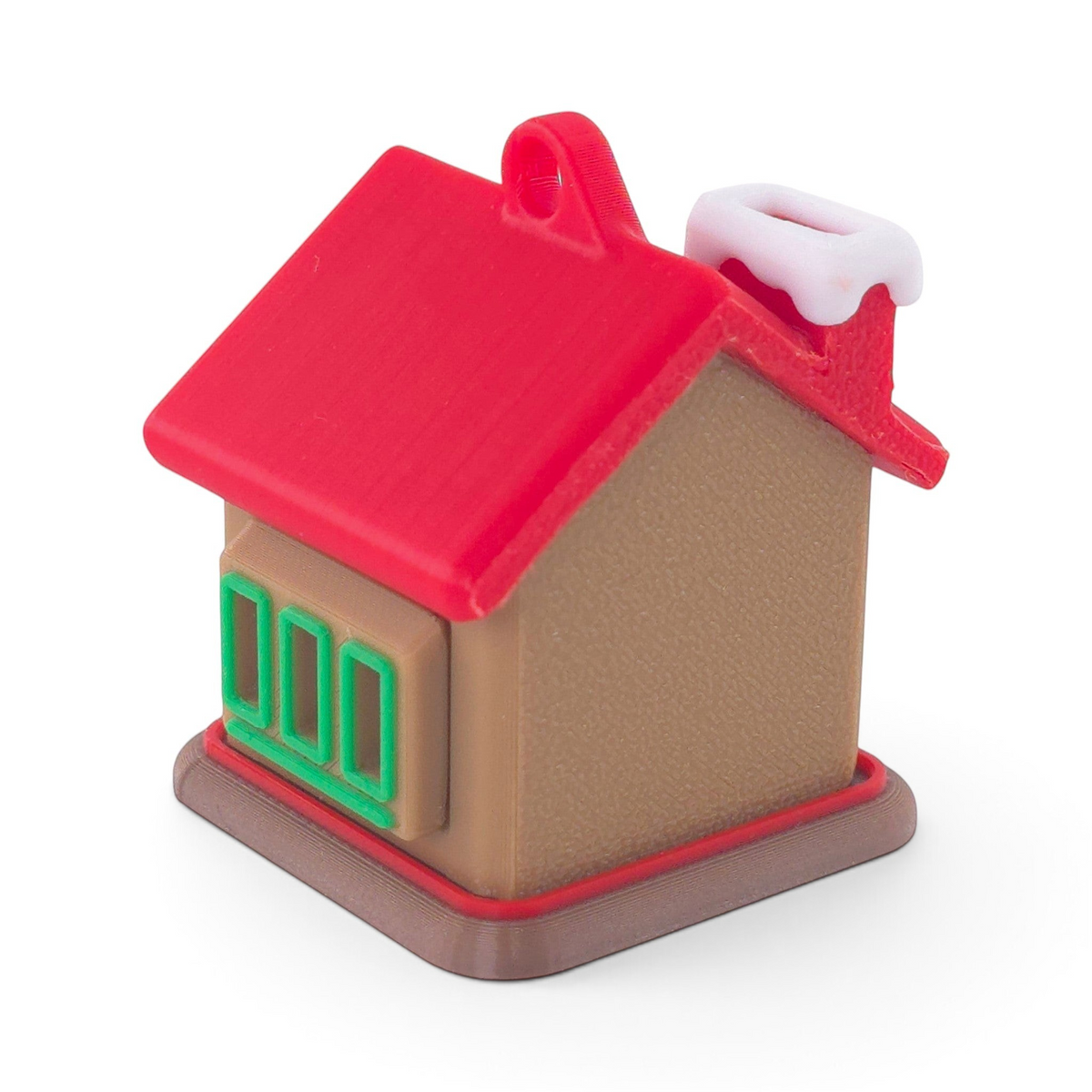 gingerbread house Christmas ornament made of brown, red, and green PLA plastic with a hanging loop.