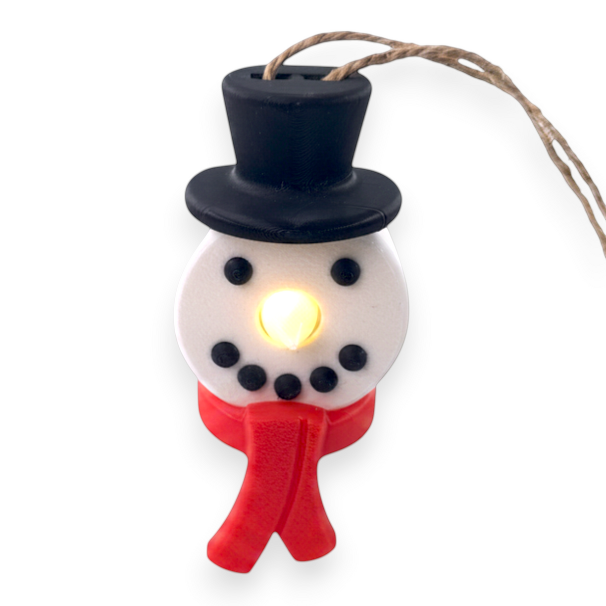 snowman tea light ornament with a black top hat, red scarf, and glowing warm LED nose
