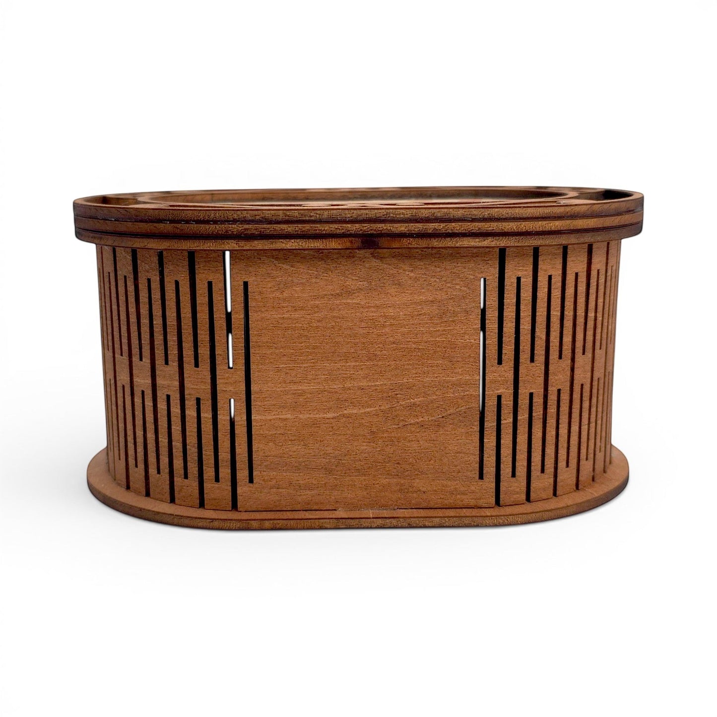 Oval wooden keepsake box with laser-cut slatted sides and a natural wood finish. Front side view of box, showing open slats.