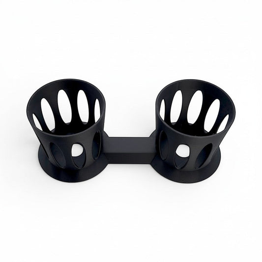 Divine Custom Works black PLA plastic dual cup holder with an open-vented design for stable drink mixing stations. Front.