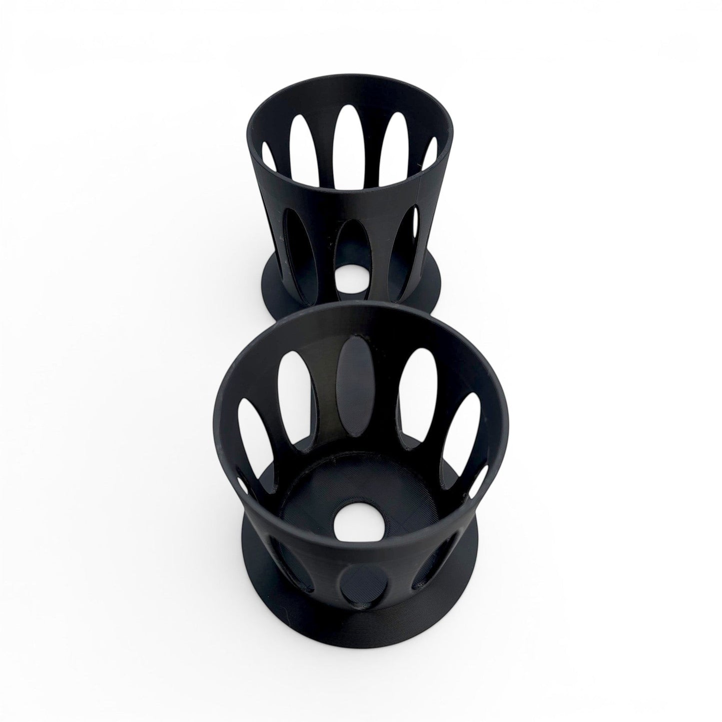 black dual cup holder made of lightweight PLA plastic with an open-vented design for mixing. Left Side.