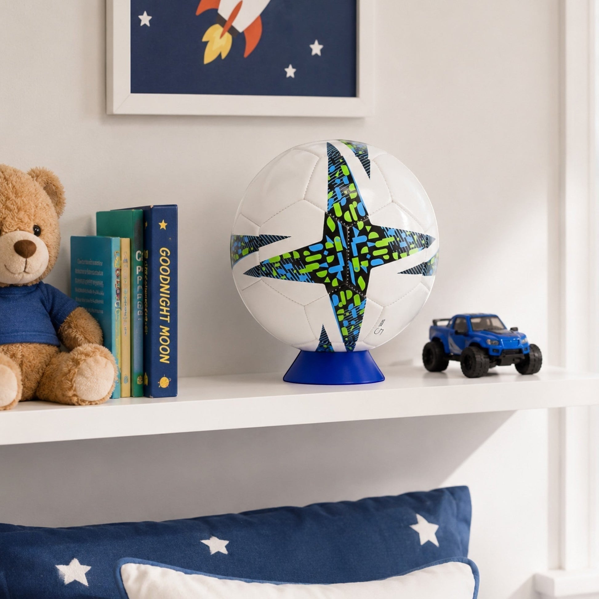 PLA plastic sports ball stand displaying a soccer ball on a child's bedroom shelf.