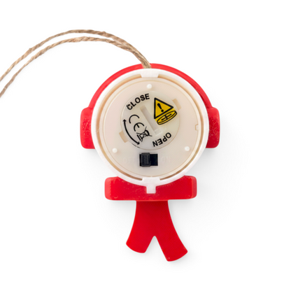 Back view of a Divine Custom Works snowman tea light ornament with a battery compartment and hanging twine string.