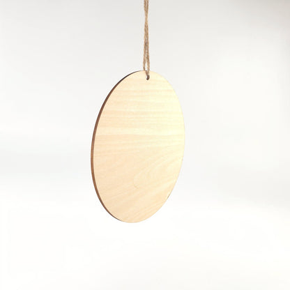 He Lives Easter wooden ornament with cross, lilies, and dove design.