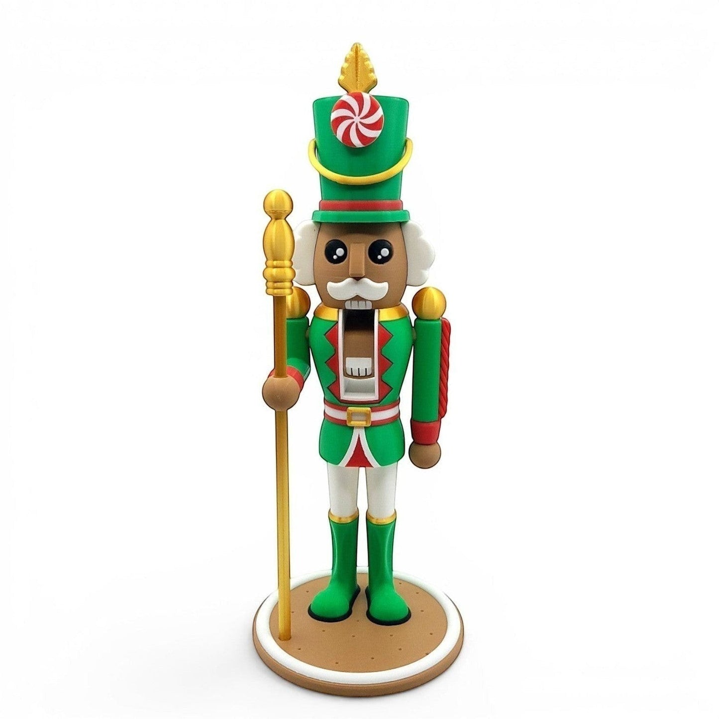 Festive Nutcracker Decoration in green uniform with gold accents, holding a staff with mouth open. Features candy cane hat detail.