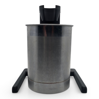 front of black immersion blender stand with a stainless steel canister for organized kitchen storage