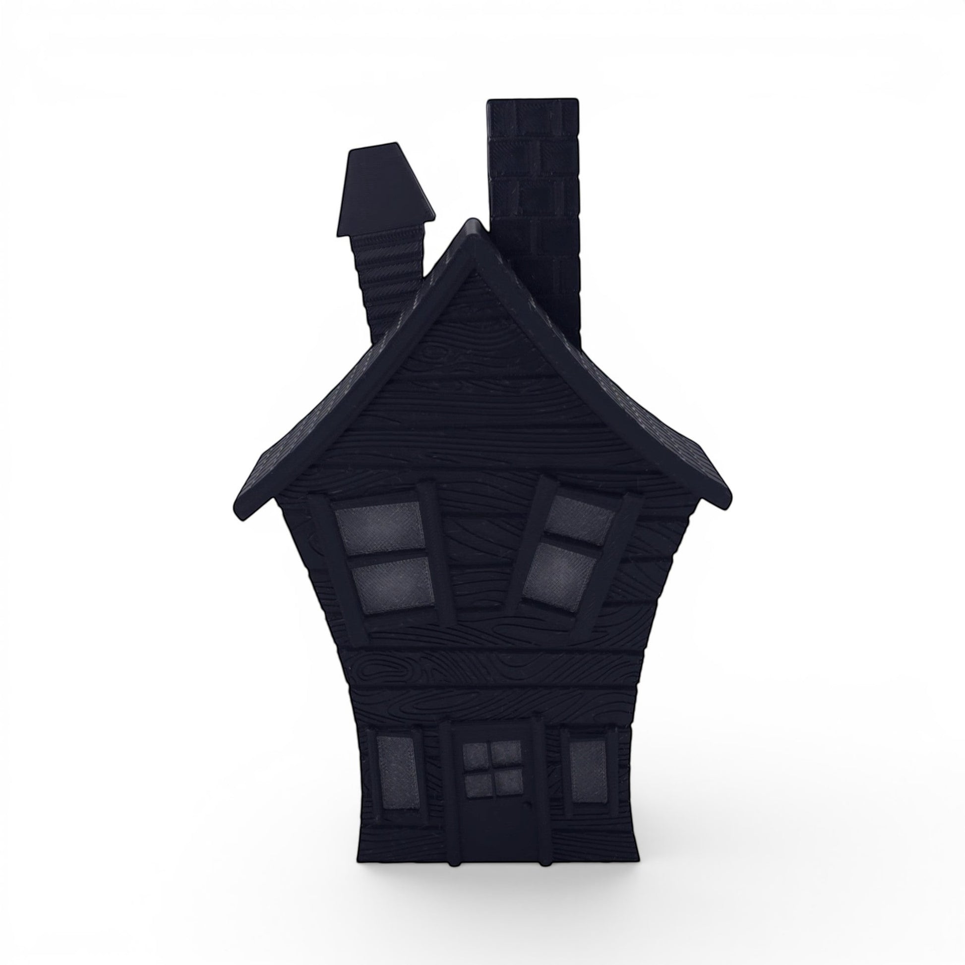 Black PLA flickering haunted house decoration with textured wood grain and window details. Front of house.