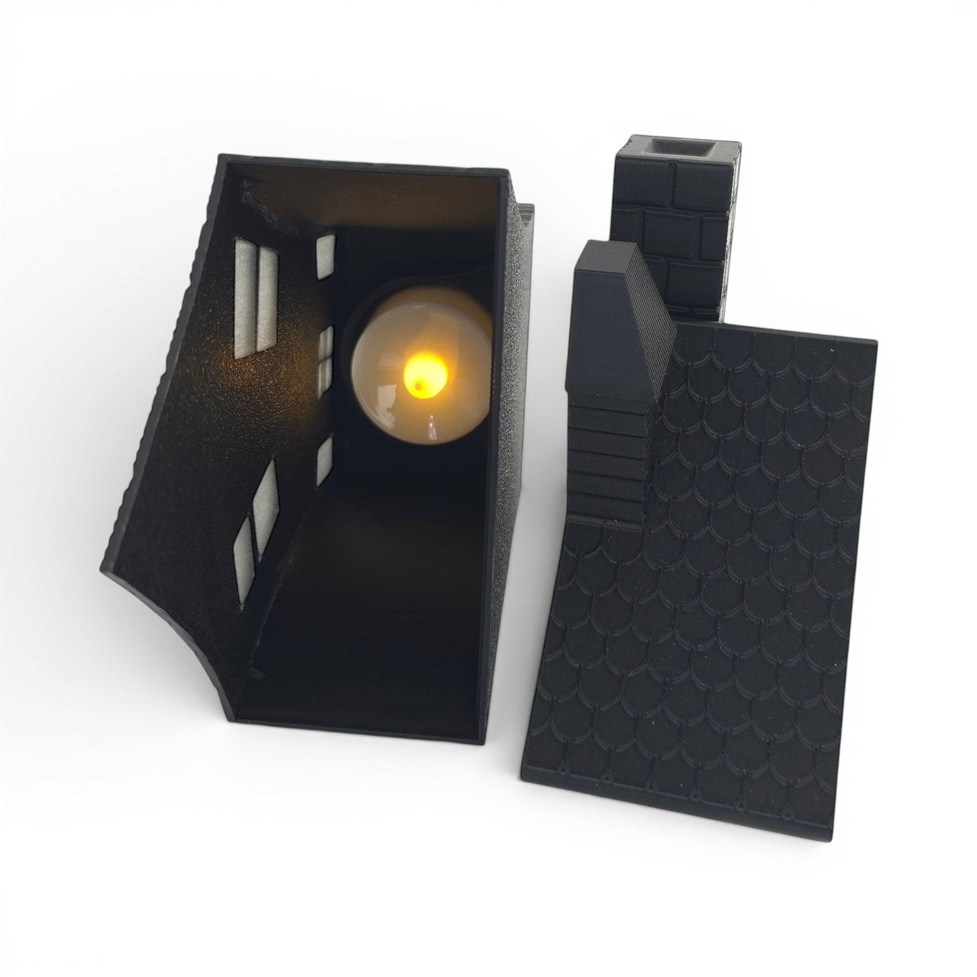 Black PLA flickering haunted house decoration with LED candle and textured roof. LED inside house. Removed roof.