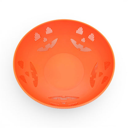 Orange PLA plastic Jack-o'-lantern candy bowl with carved face details, perfect for Halloween. Top down of bowl, empty.