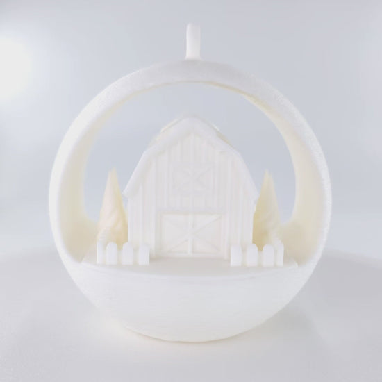 Rotating Illuminated Winter Barn Ornament . First half is with the LED tealight off and the second half is with LED tealight off. 