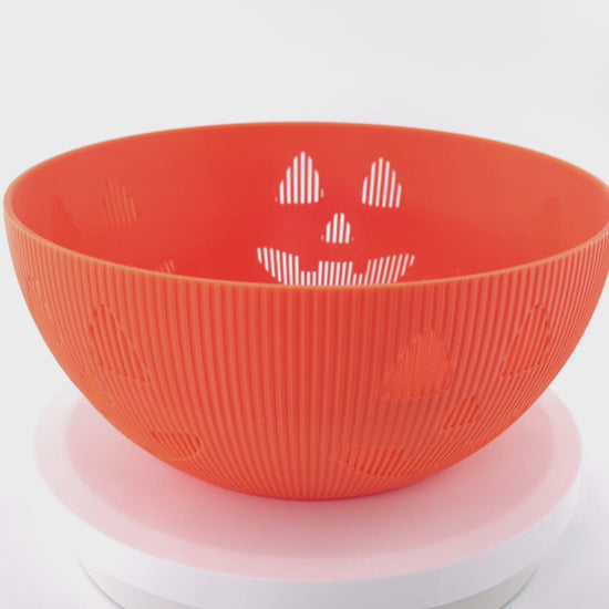 Rotating jack-o'-lantern candy bowl. First half of the video the bowl is empty and the second half of the video the bowl is full of candy.