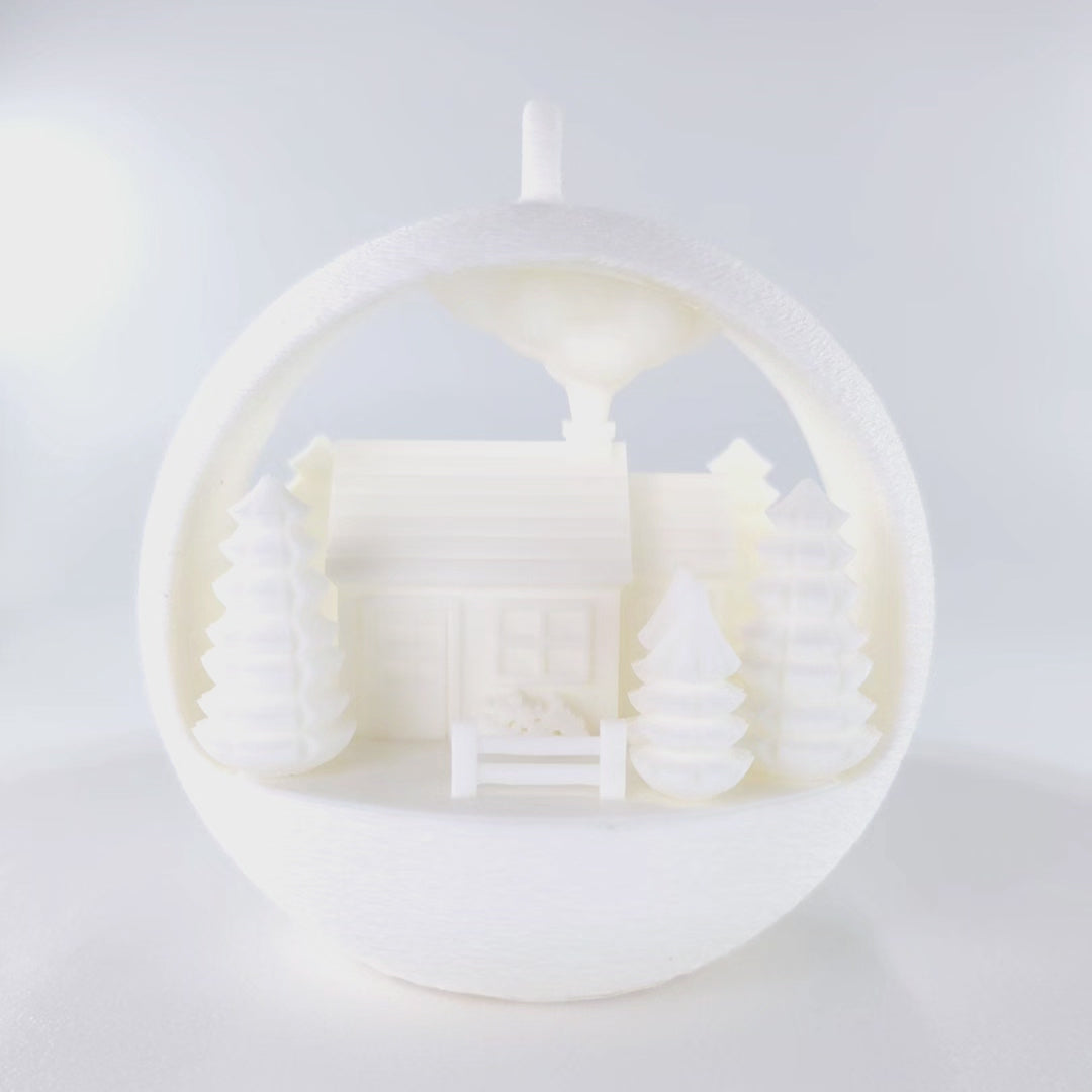 Rotating Illuminated Winter Farmhouse Ornament. First half has LED off and second half has LED on with the background lights dimmed.  