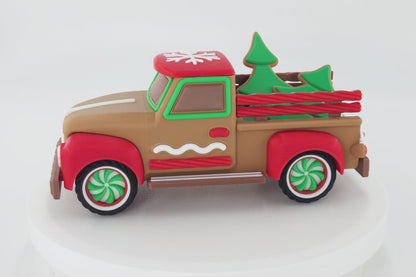 Rotating Vintage Christmas Truck Decoration featuring Christmas Tree cookie cutouts and candy themed decor. 