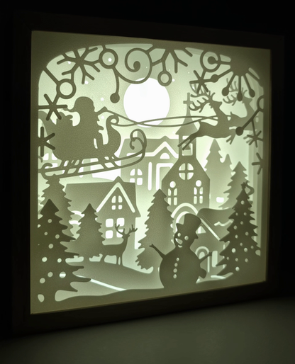 Rotating LED Illuminated Christmas Village and Santa Lightbox. 