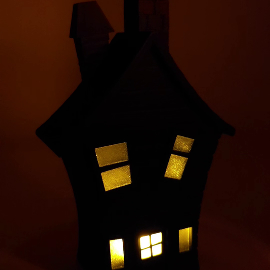 Rotating Flickering Haunted House Decoration. First half LED lights off. Second half LED lights on. 