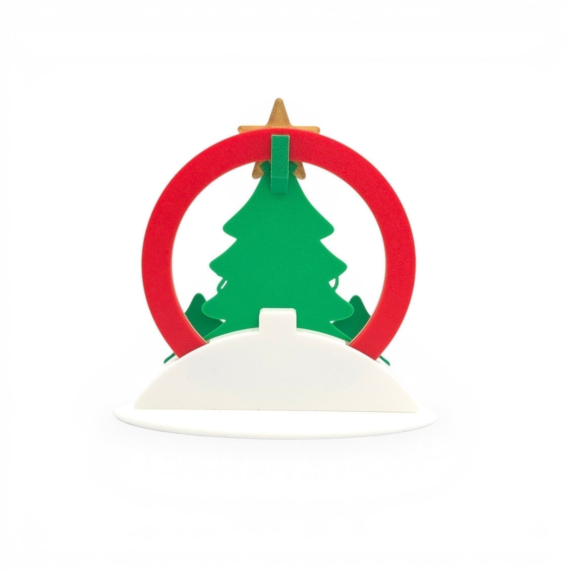 Christmas Advent Rotating Calendar backside shot with green tree, red ring, and gold star.