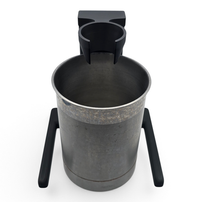top of black immersion blender stand with a stainless steel container for organized kitchen storage.