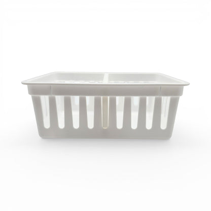 white plastic storage basket divider with a slatted design for home organization. Front view of basket with one divider.